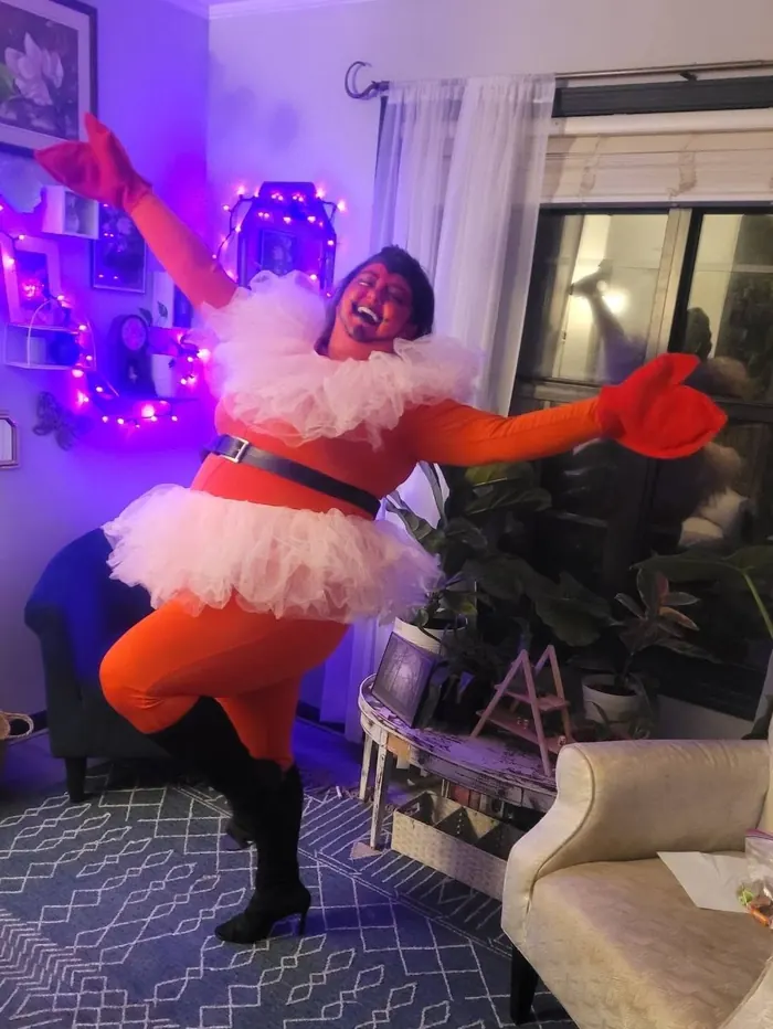 Jordan in a homemade orange costume with a tutu