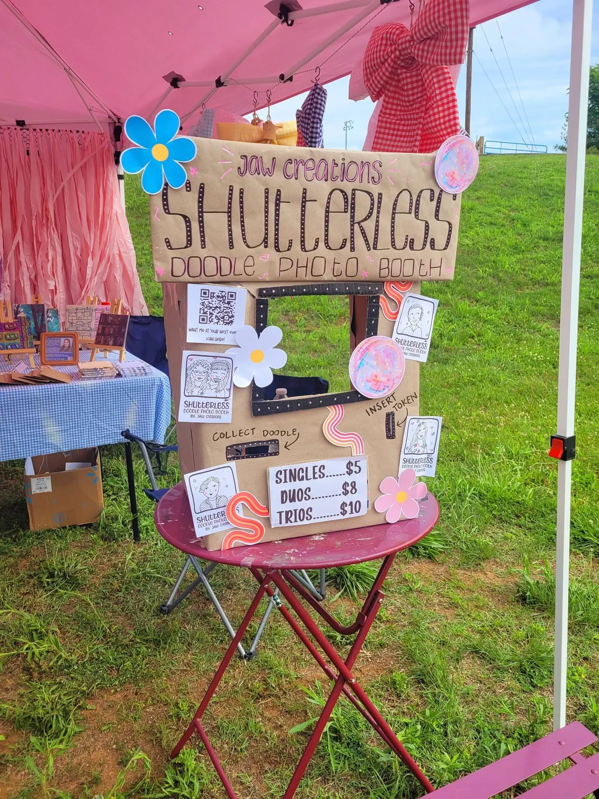 Shutterless Doodle Photo Booth set up at an outdoor festival