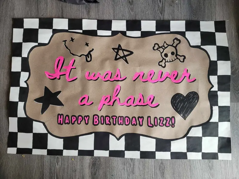 It Was Never a Phase birthday banner with black and white checks