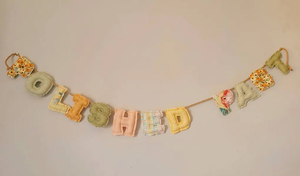 Patterned fabric letter banner