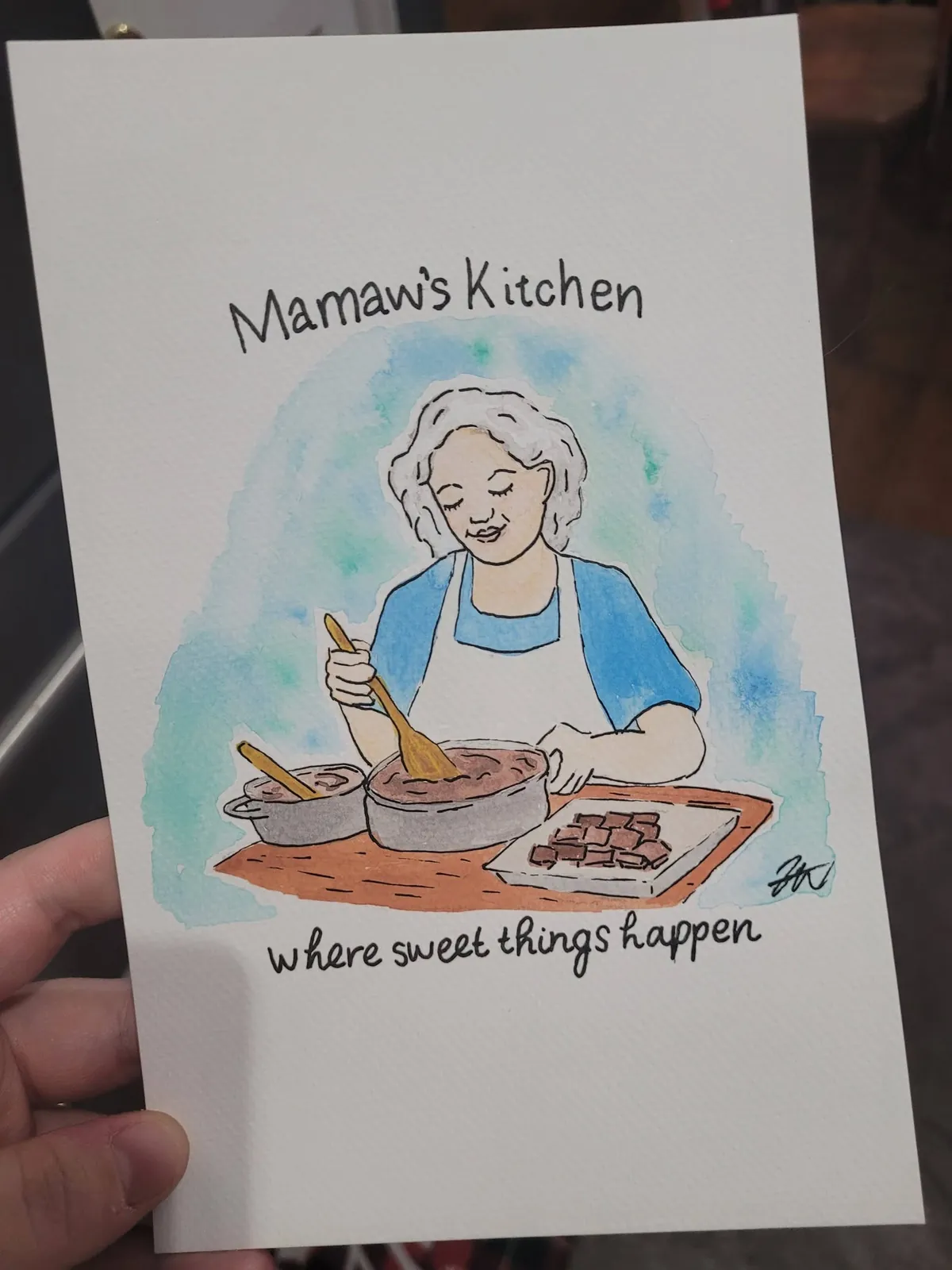 Mamaw's Kitchen card painted with a grandmother baking
