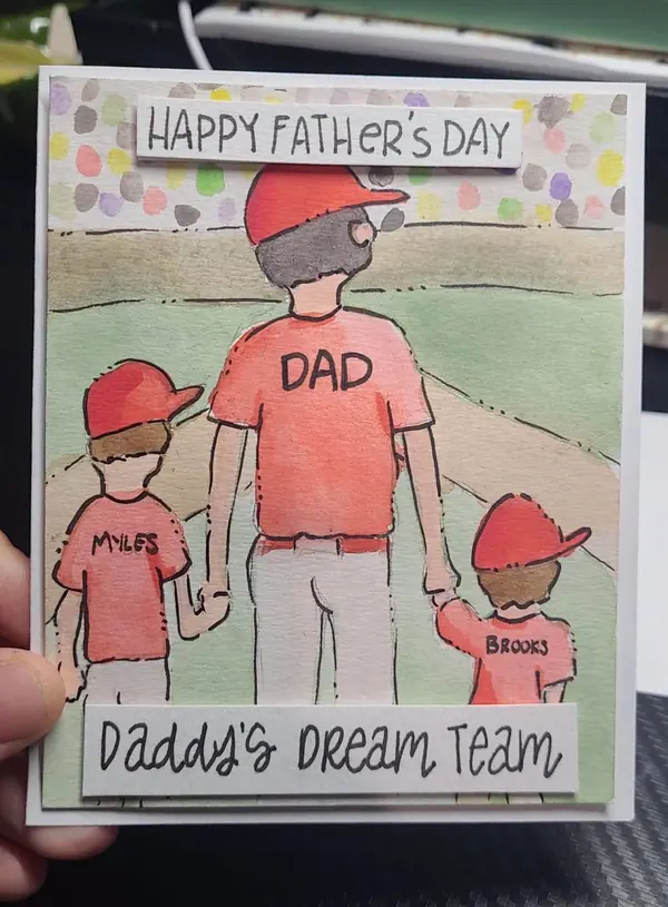 Daddy's Dream Team Father's Day card with a dad and two boys in baseball caps