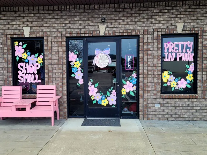 Spring storefront windows with Shop Small and Pretty in Pink