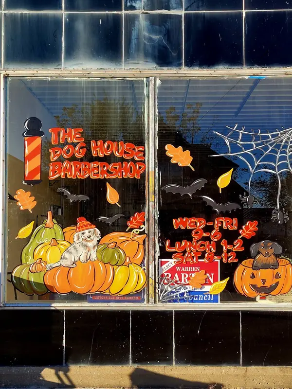 The Dog House Barbershop Halloween windows